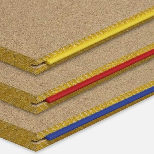 Yellow, red and blue tongue particle board flooring sheets stacked